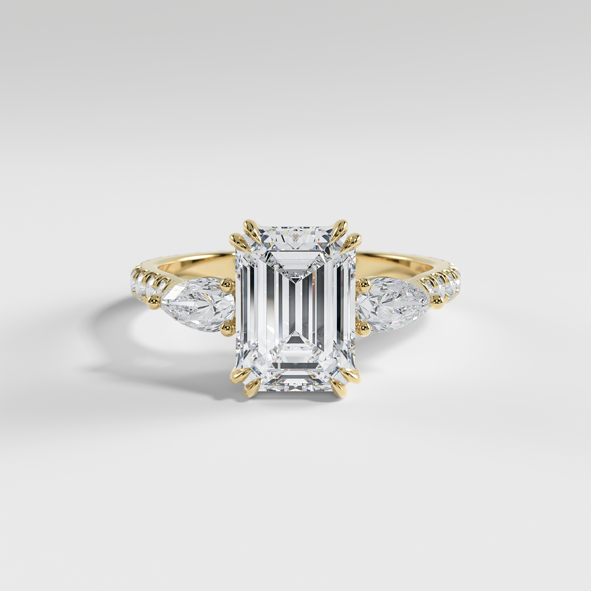 ISLA - Emerald Three-Stone Engagement Ring with Pear Side Stones and Pavé Cathedral Band