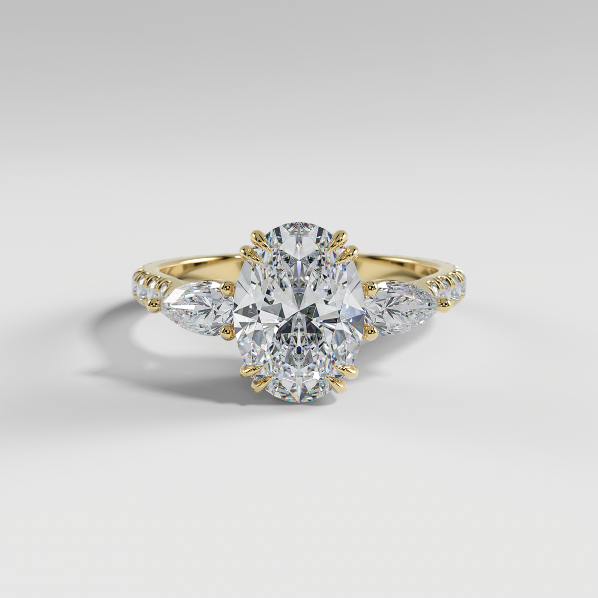 ISLA - Oval Three-Stone Engagement Ring with Pear Side Stones and Pavé Cathedral Band