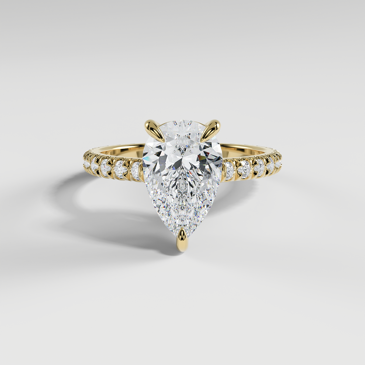DELILAH - Pear Solitaire Engagement Ring with Pavé Diamond Band and Low-Set Donut Basket