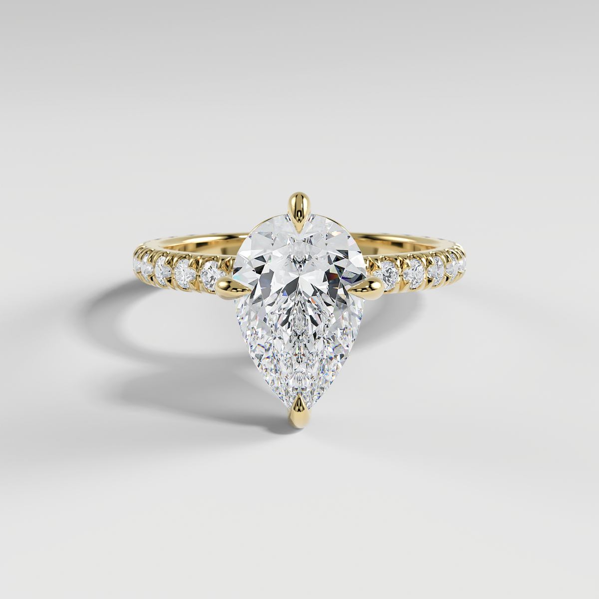 ANNA - Pear North–South Solitaire Engagement Ring with Pavé Diamond