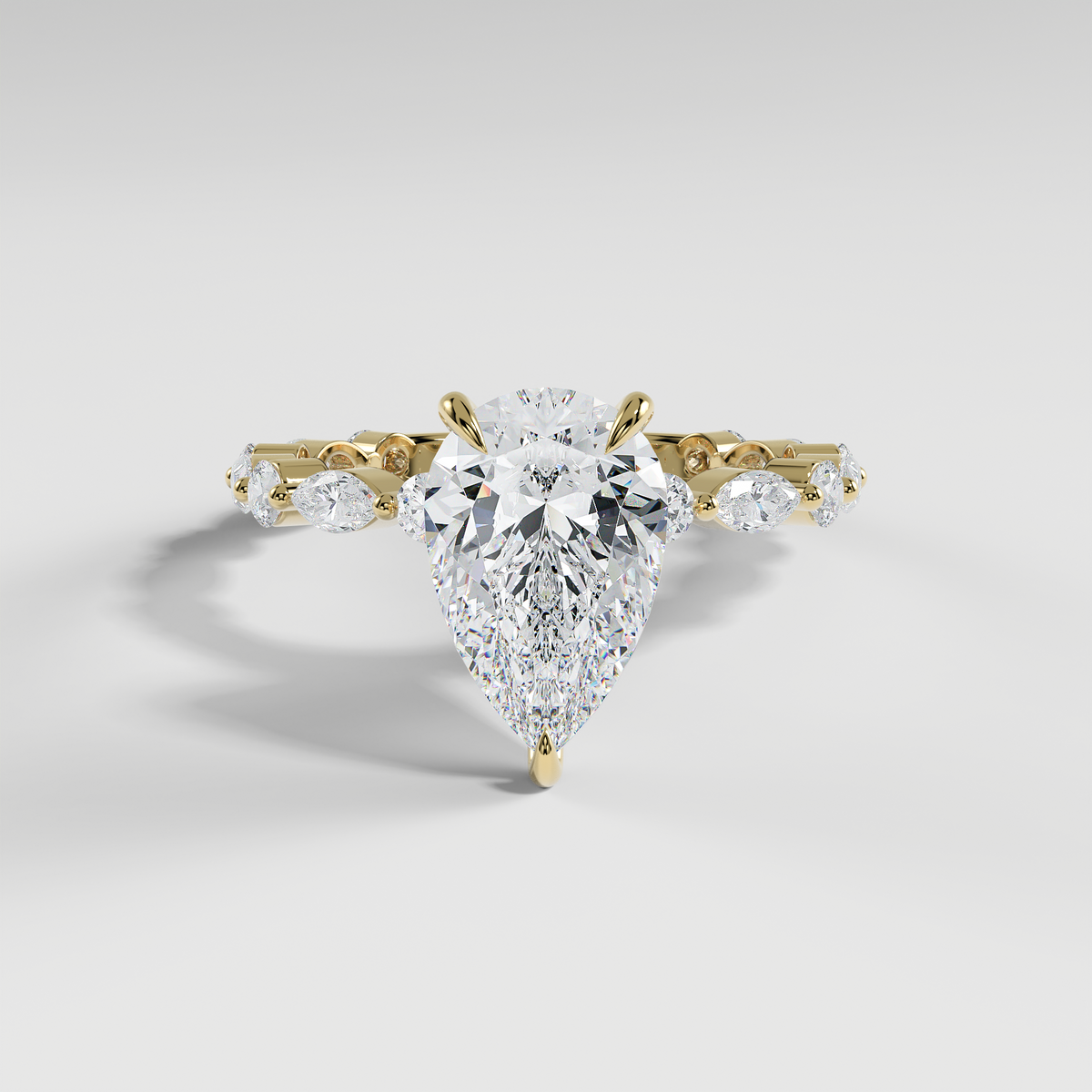 VALENTINA - Pear Solitaire Engagement Ring with Marquise & Round Accent Stones