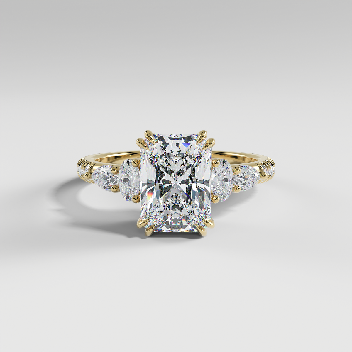 ELEANOR - Radiant Five-Stone Diamond Ring with Oval & Pear Side Stones and Pavé Band