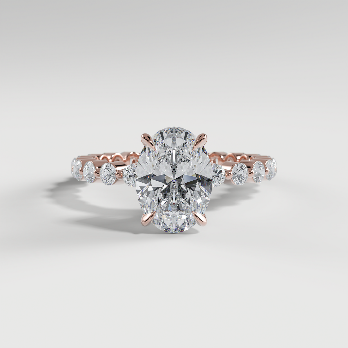 CHLOE - Oval Solitaire Engagement Ring with 2.2mm Round Accent Diamonds