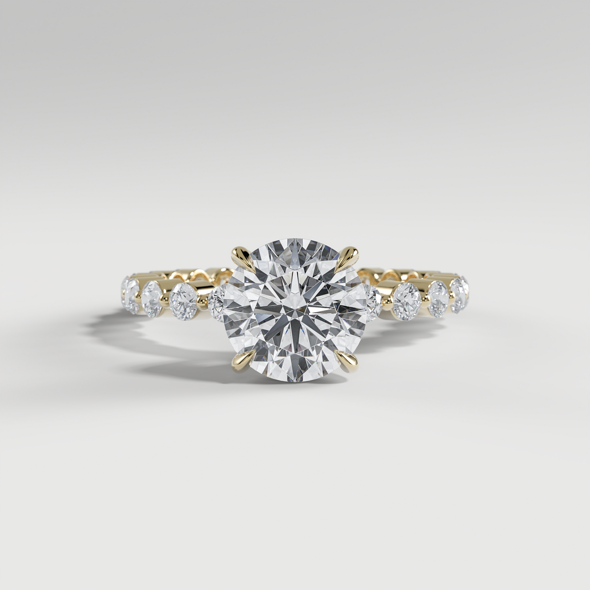 CHLOE - Round Solitaire Engagement Ring with 2.2mm Round Accent Diamonds