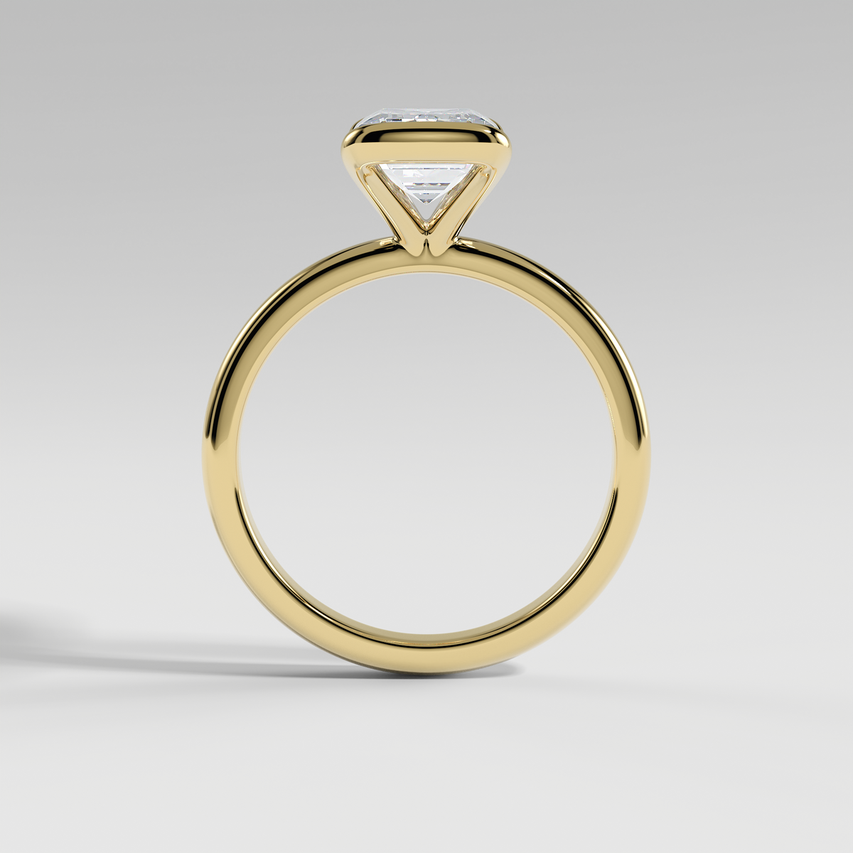 POPPY - Emerald Solitaire Engagement Ring with Half Bezel Setting and Polished Band