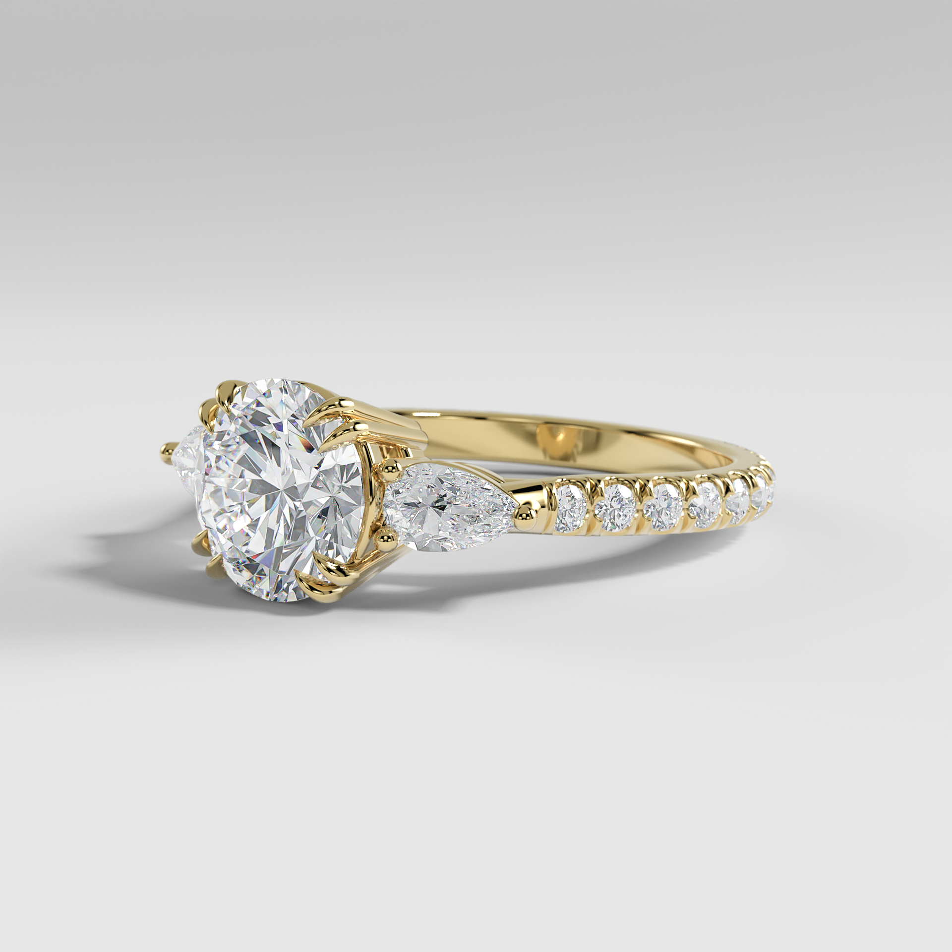 ISLA - Round Three-Stone Engagement Ring with Pear Side Stones and Pavé Cathedral Band