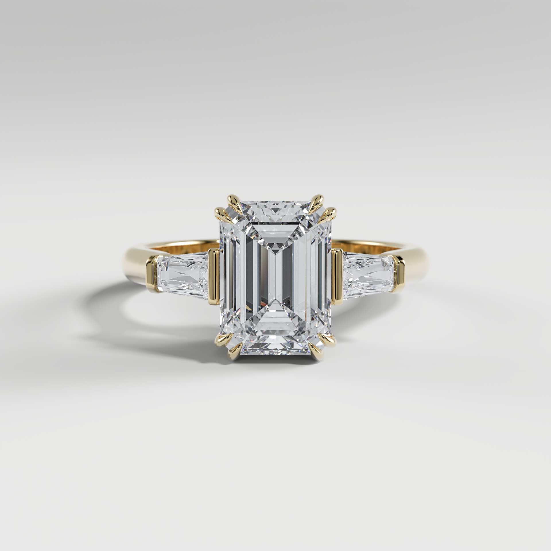 LILY - Emerald Three-Stone Engagement Ring with Tapered Baguette Side Stones and Polished Cathedral Band