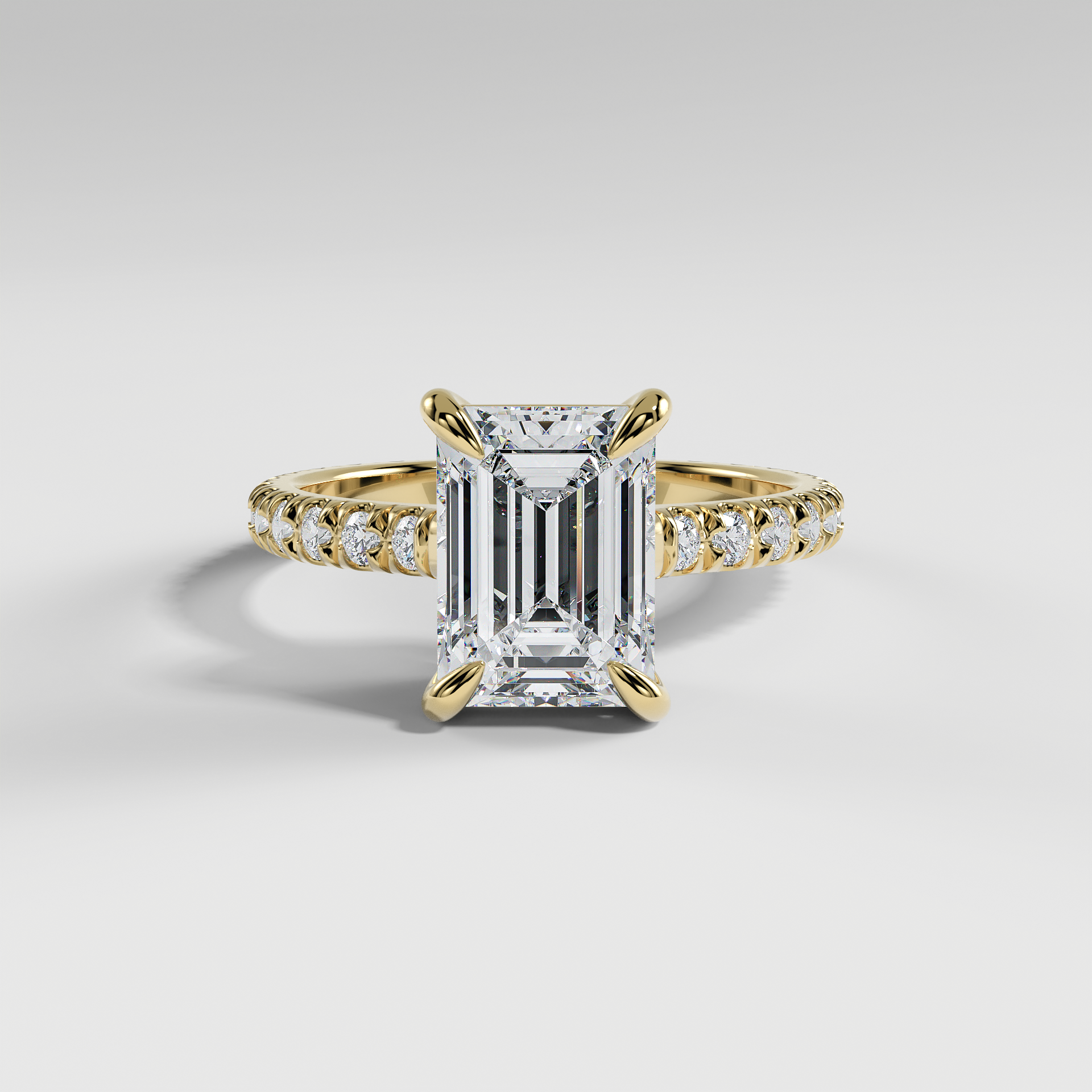 DELILAH - Emerald Solitaire Engagement Ring with Pavé Diamond Band and Low-Set Donut Basket