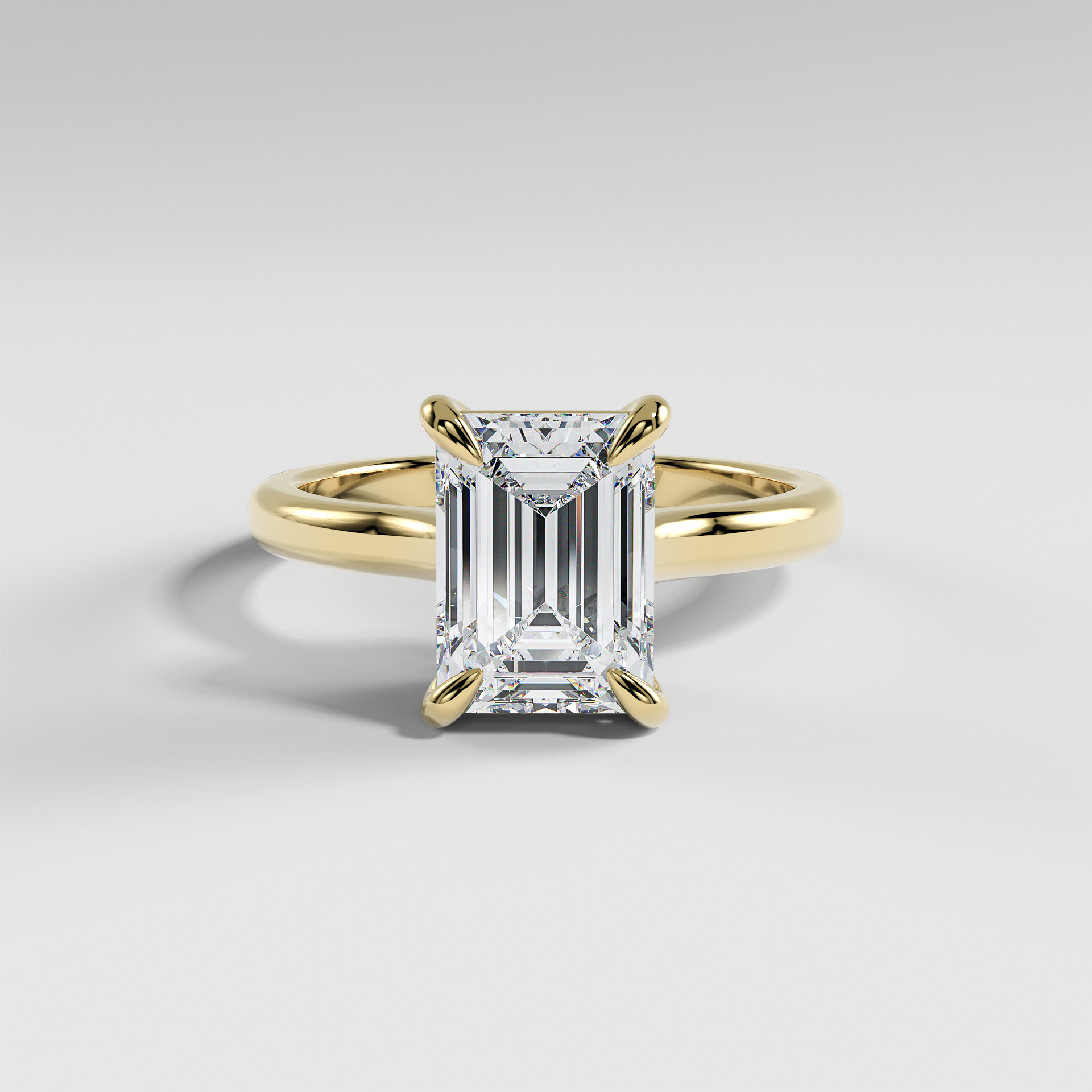 PAISLEY - Emerald Solitaire Engagement Ring with Low-Set Donut Basket and Polished Band
