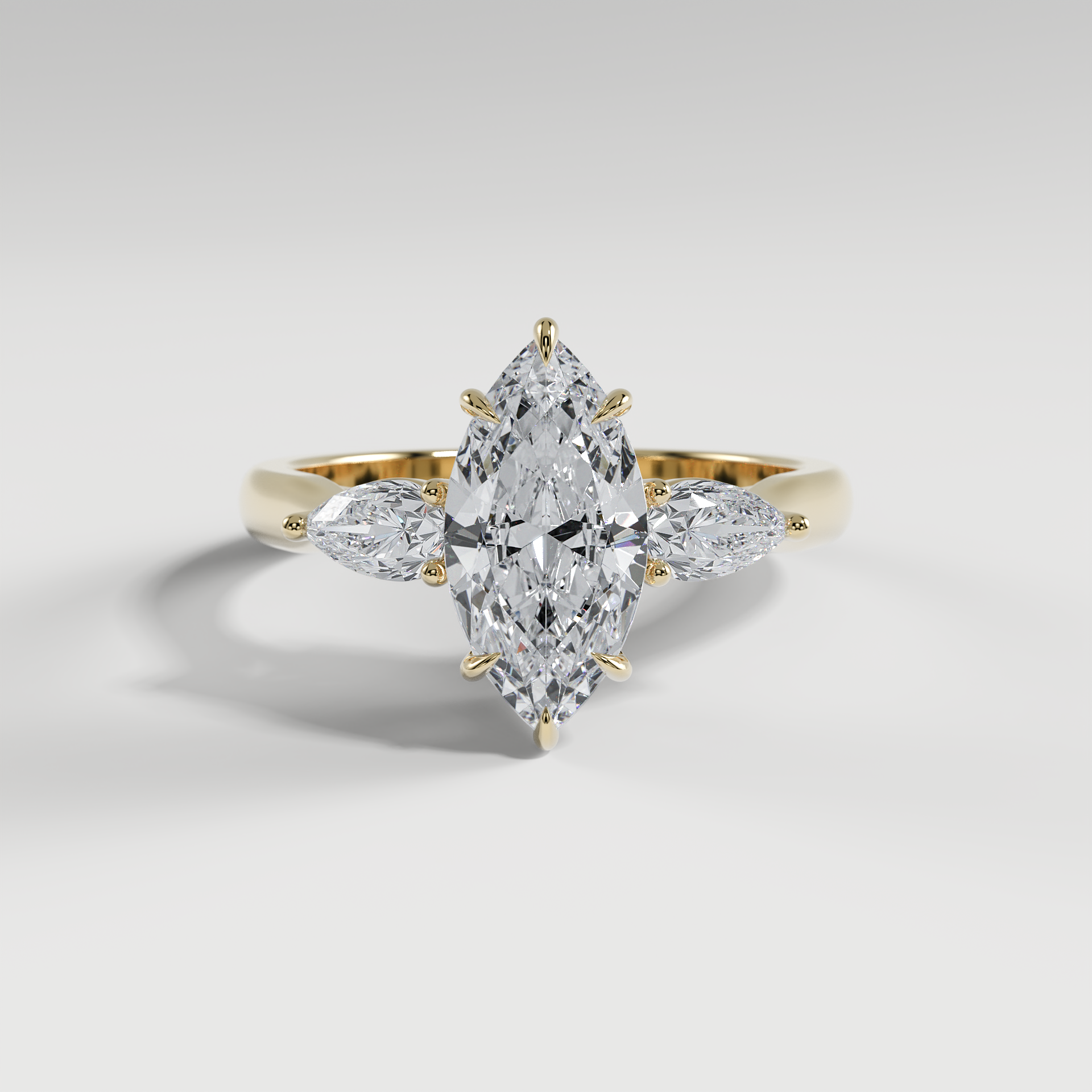 HAZEL - Marquise Three-Stone Engagement Ring with Pear Side Stones and Polished Cathedral Band
