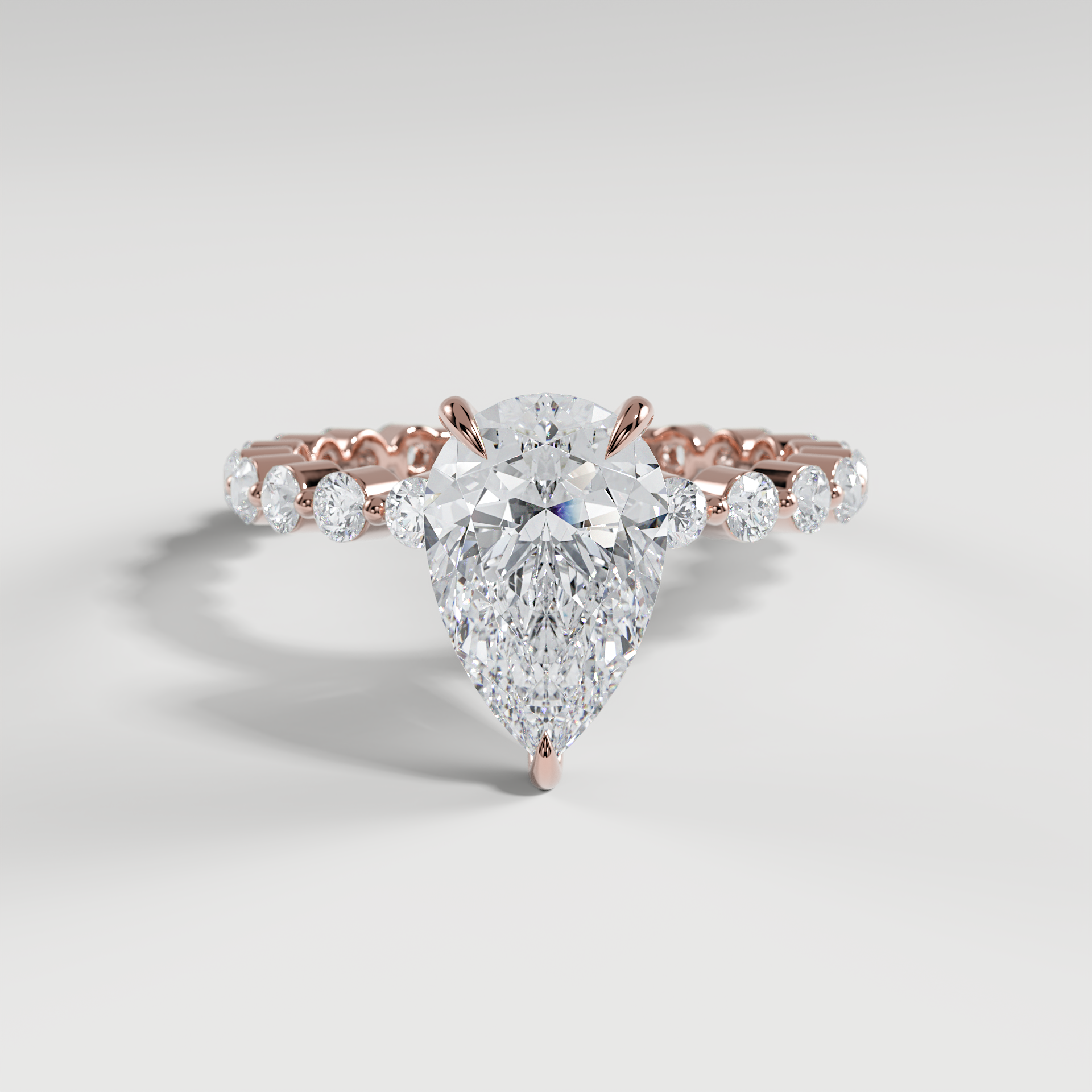 CHLOE - Pear Solitaire Engagement Ring with 2.2mm Round Accent Diamonds