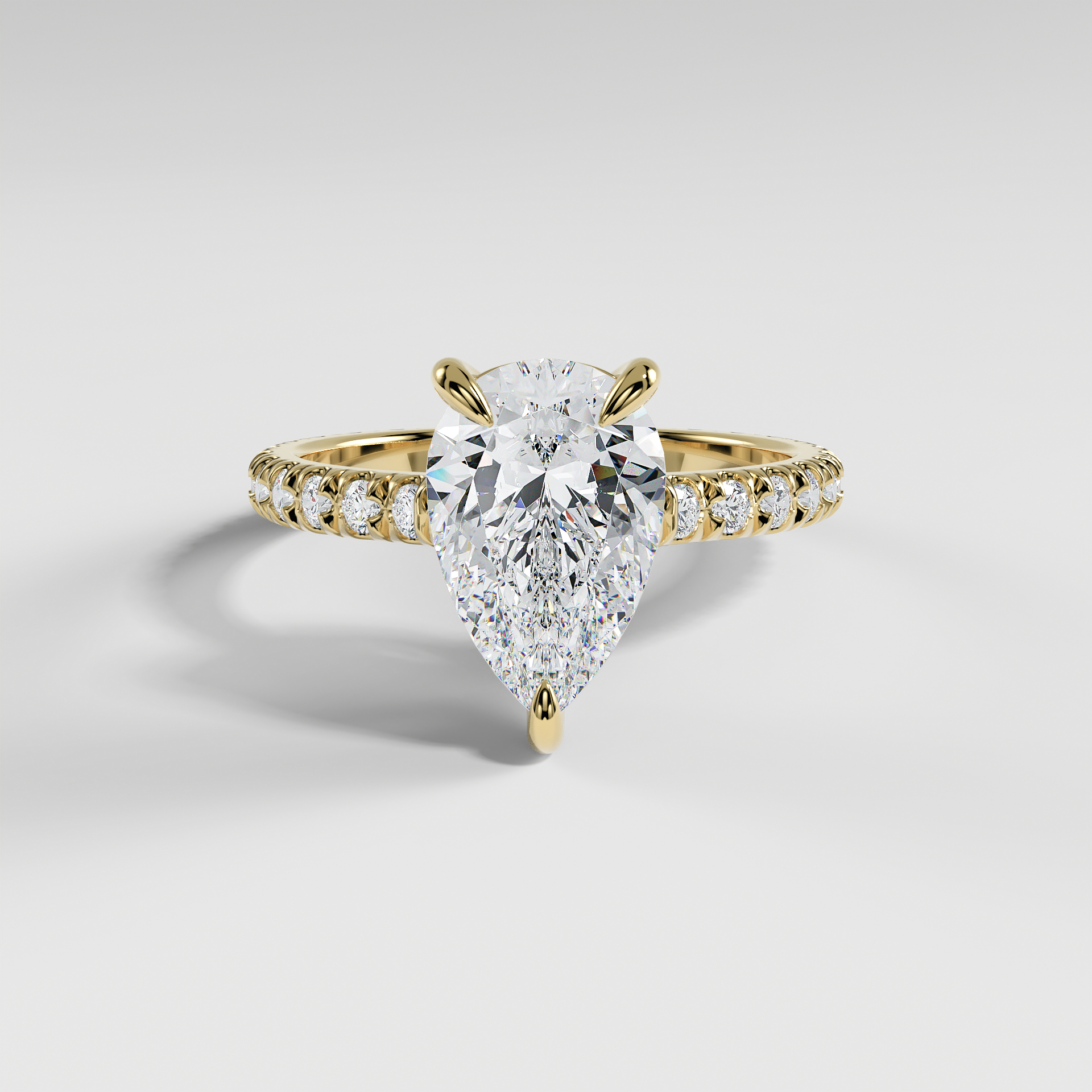 DELILAH - Pear Solitaire Engagement Ring with Pavé Diamond Band and Low-Set Donut Basket