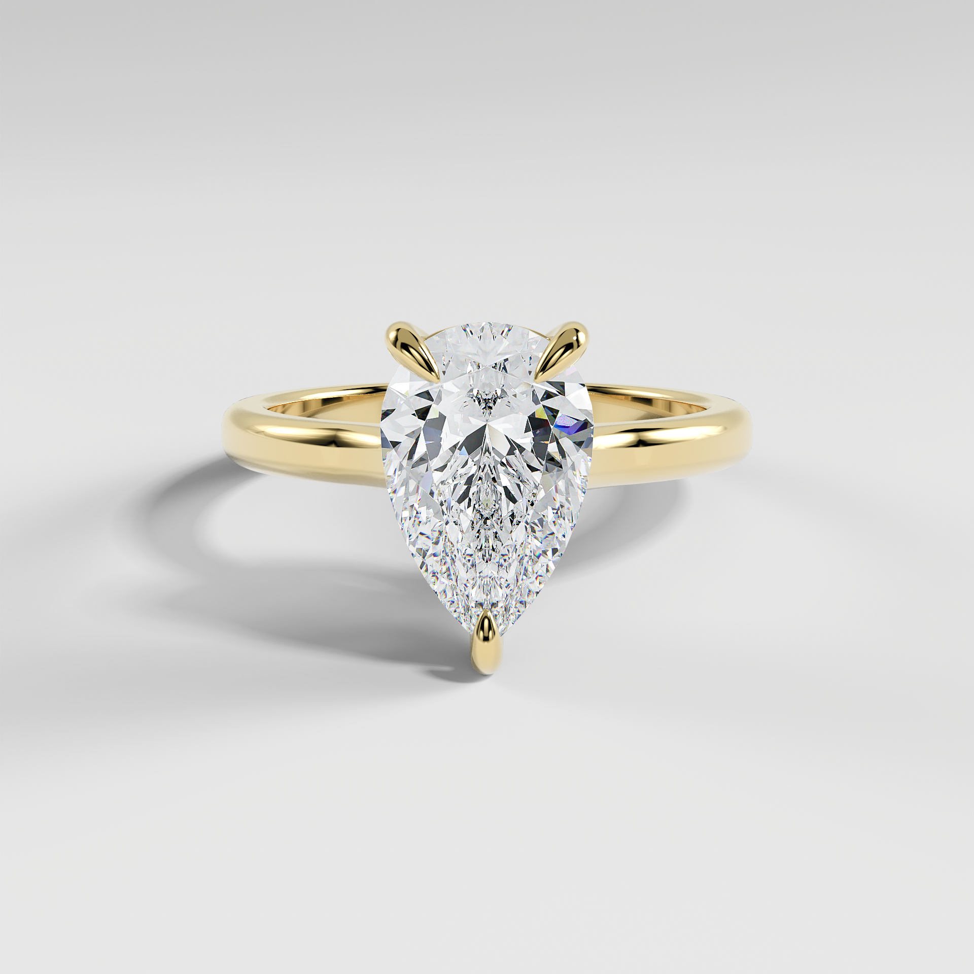 PAISLEY - Pear Solitaire Engagement Ring with Low-Set Donut Basket and Polished Band
