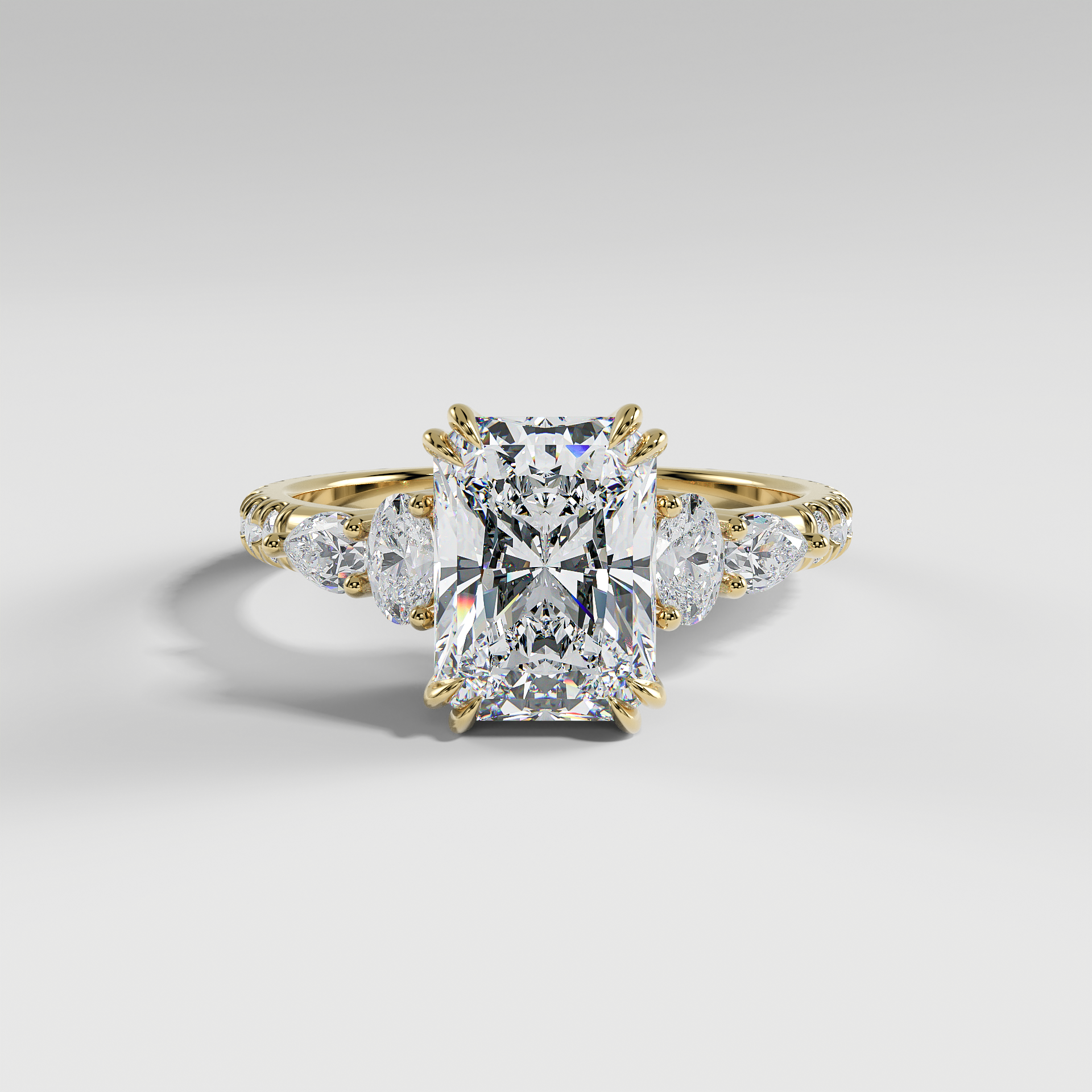ELEANOR - Radiant Five-Stone Diamond Ring with Oval & Pear Side Stones and Pavé Band