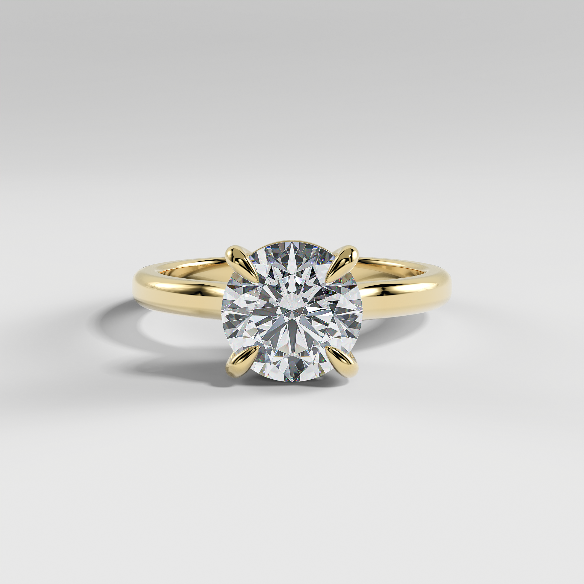 PAISLEY - Round Solitaire Engagement Ring with Low-Set Donut Basket and Polished Band