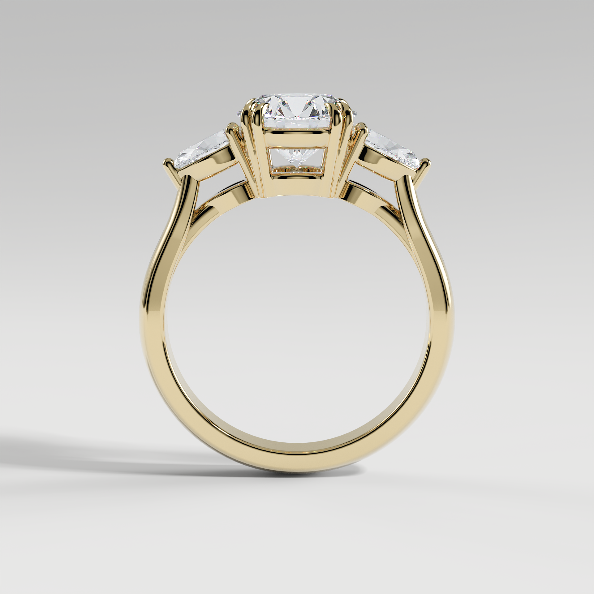 HAZEL - Round Three-Stone Engagement Ring with Pear Side Stones and Polished Cathedral Band